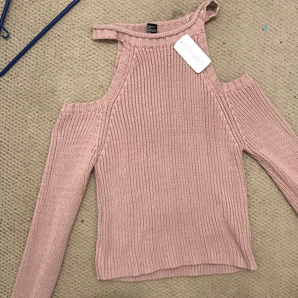 off the shoulder light pink knit shirt